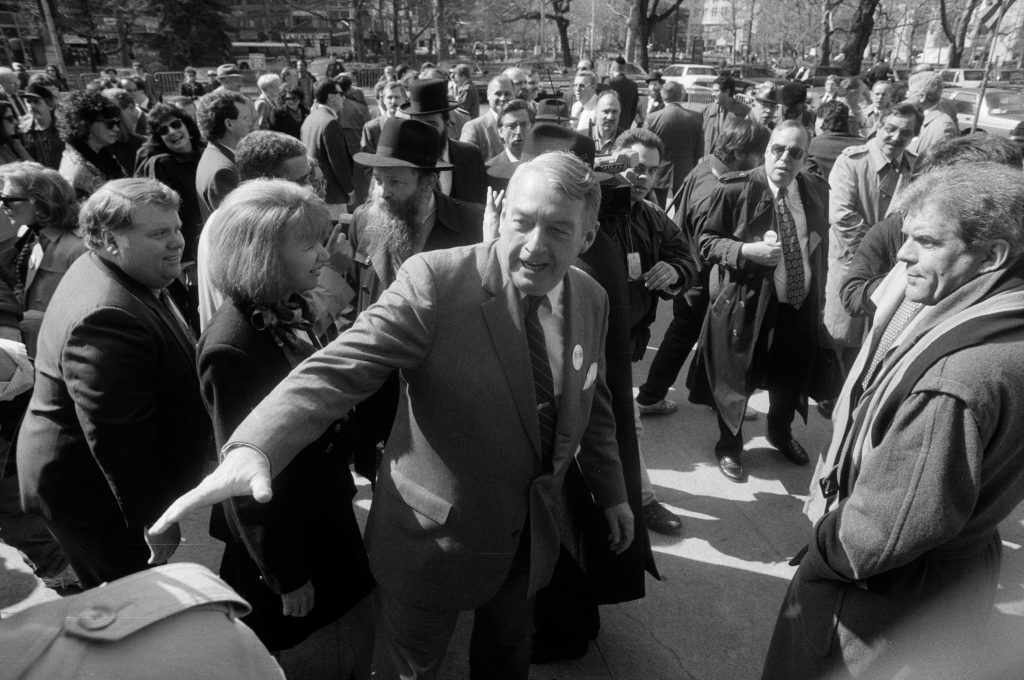 Charles J. Hynes campaigning to be the state attorney general near City Hall in New York in 1994.Credit...Ruby Washington/The New York Times